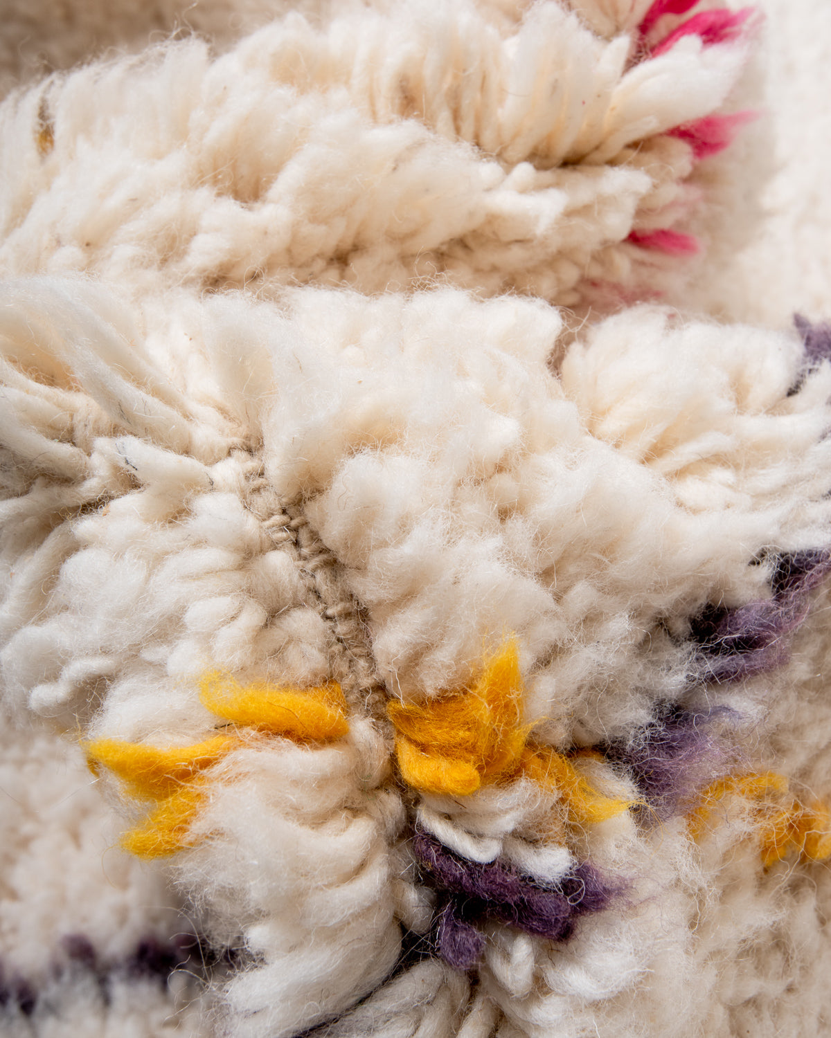 Modern, designer, handcrafted Berber rug from Morocco. Beniourain carpet with beautiful colours and patterns and fluffy wool texture.